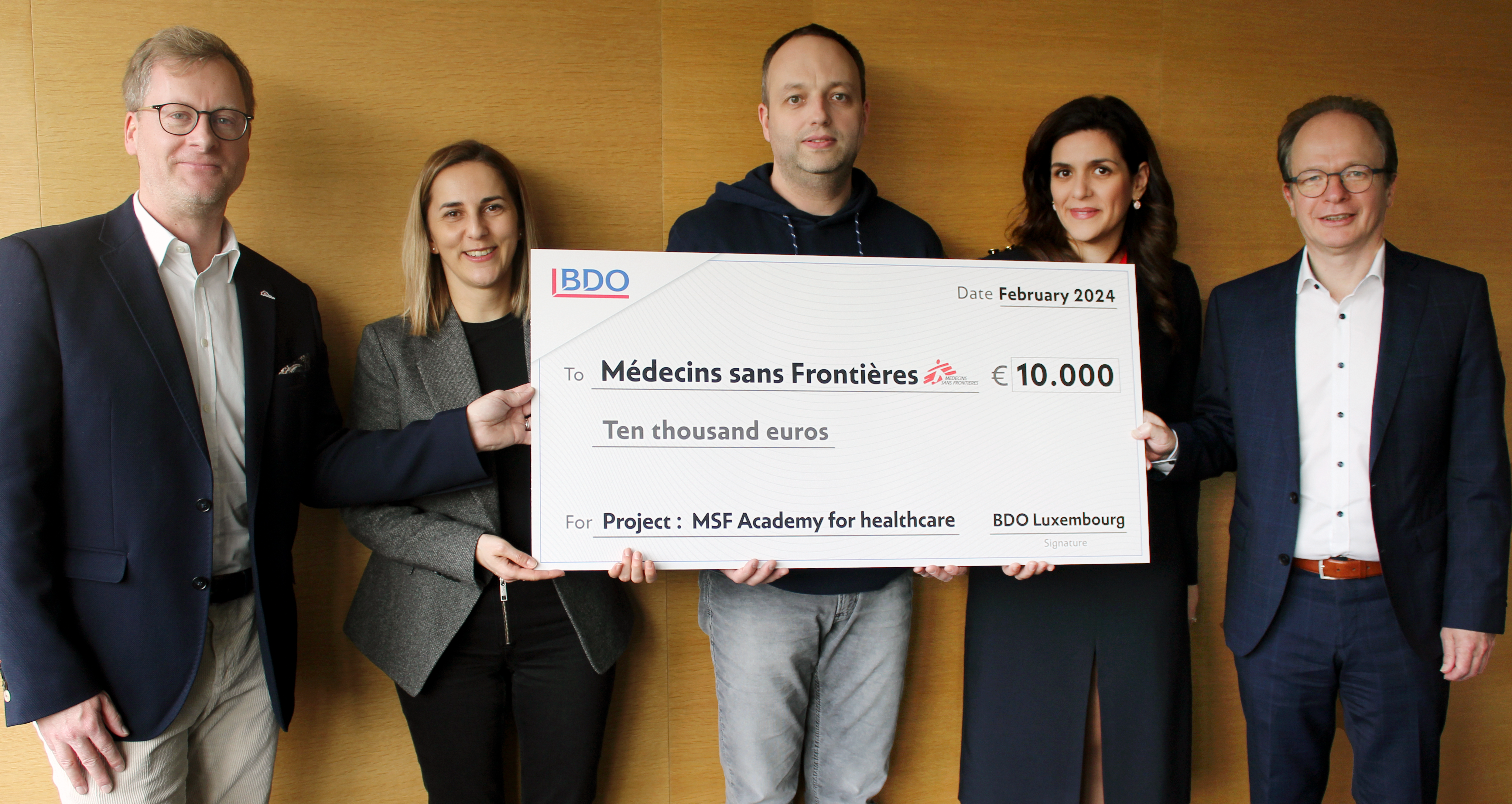 Representatives from BDO Luxembourg handing over the donation