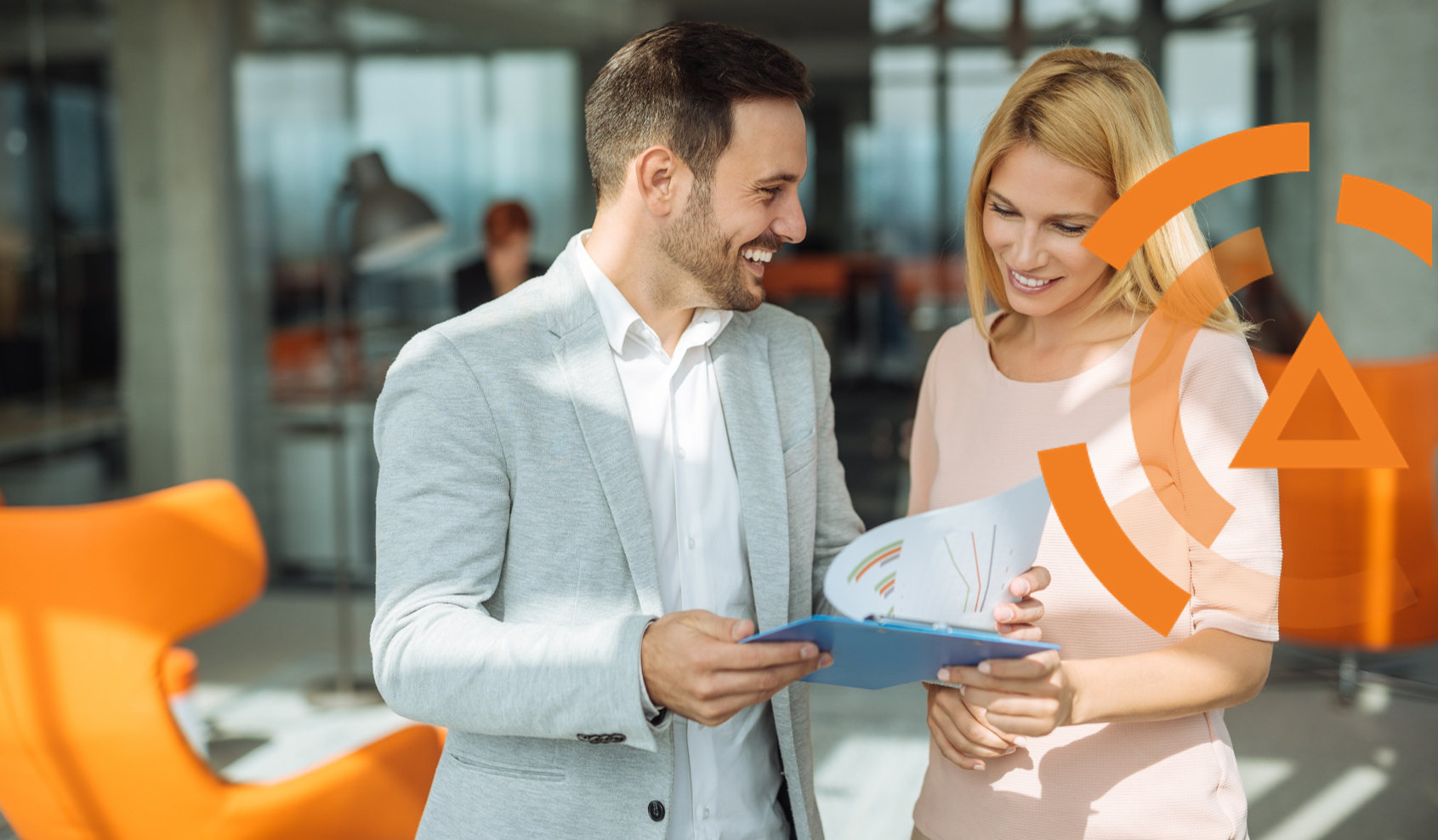 Woman and man looking at papers