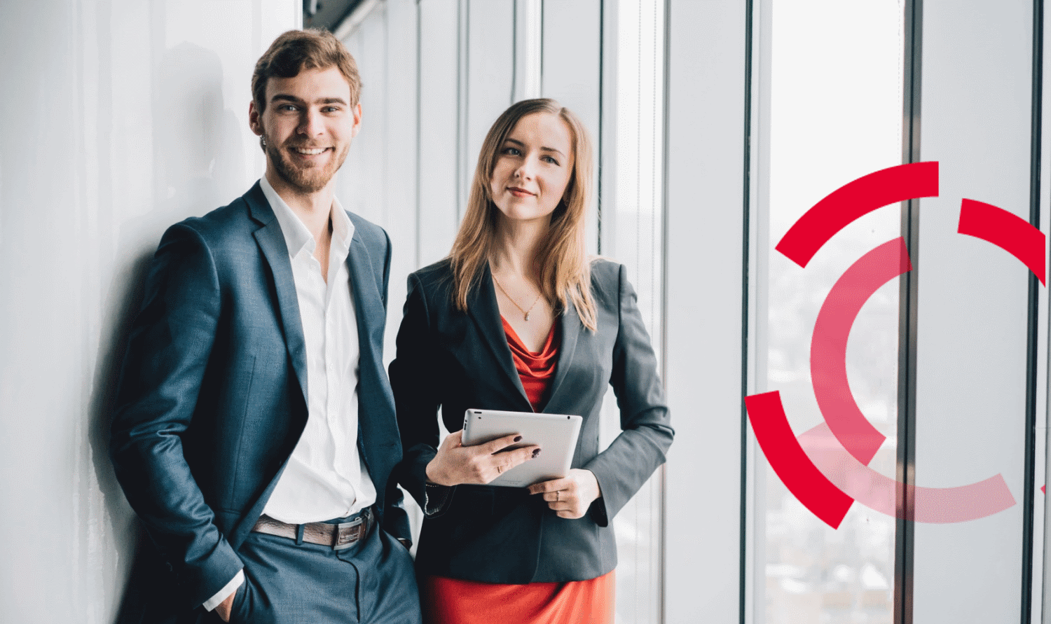 Two young business people smiling